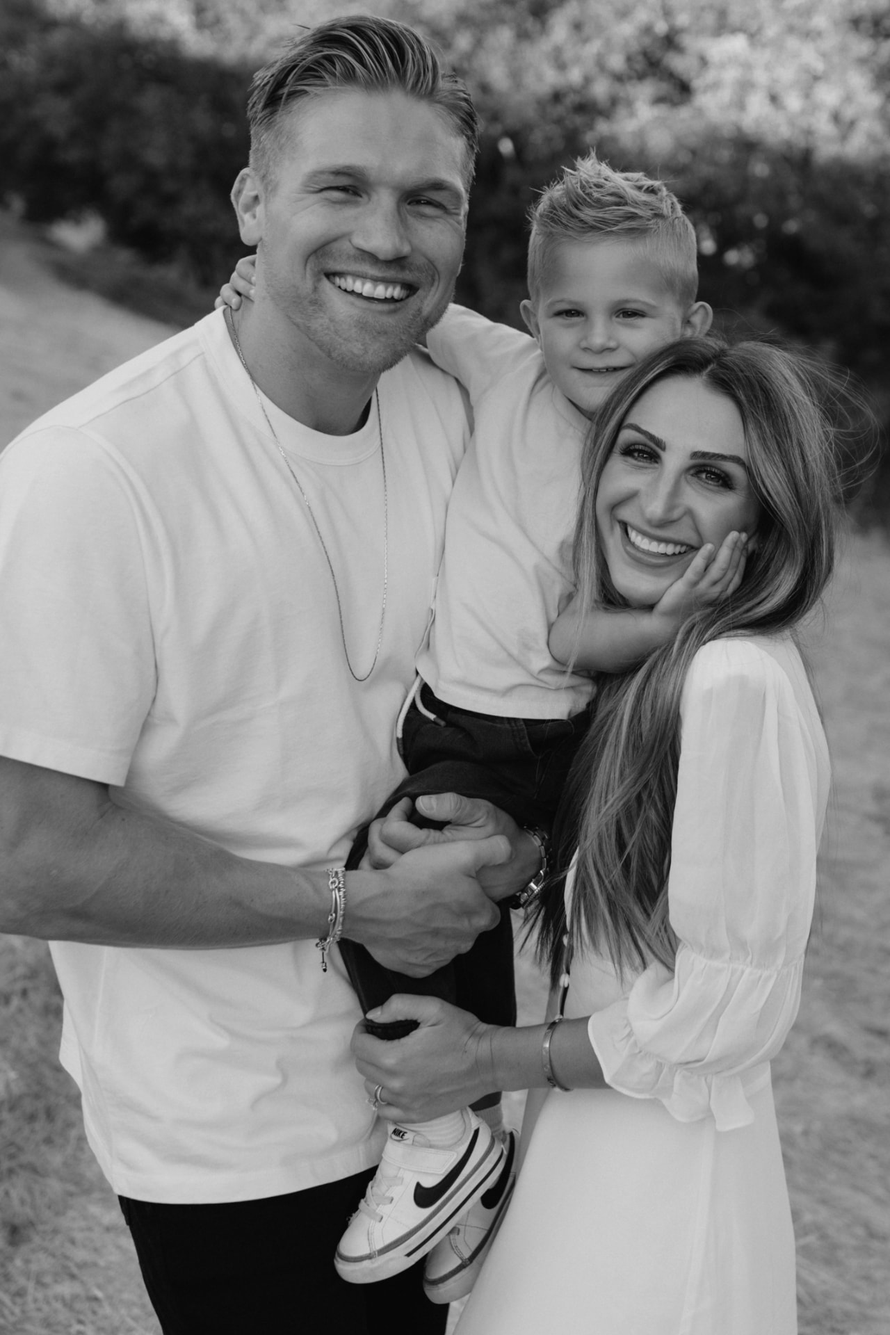 Caleb with his wife Jacquelin and son Zeke outdoors